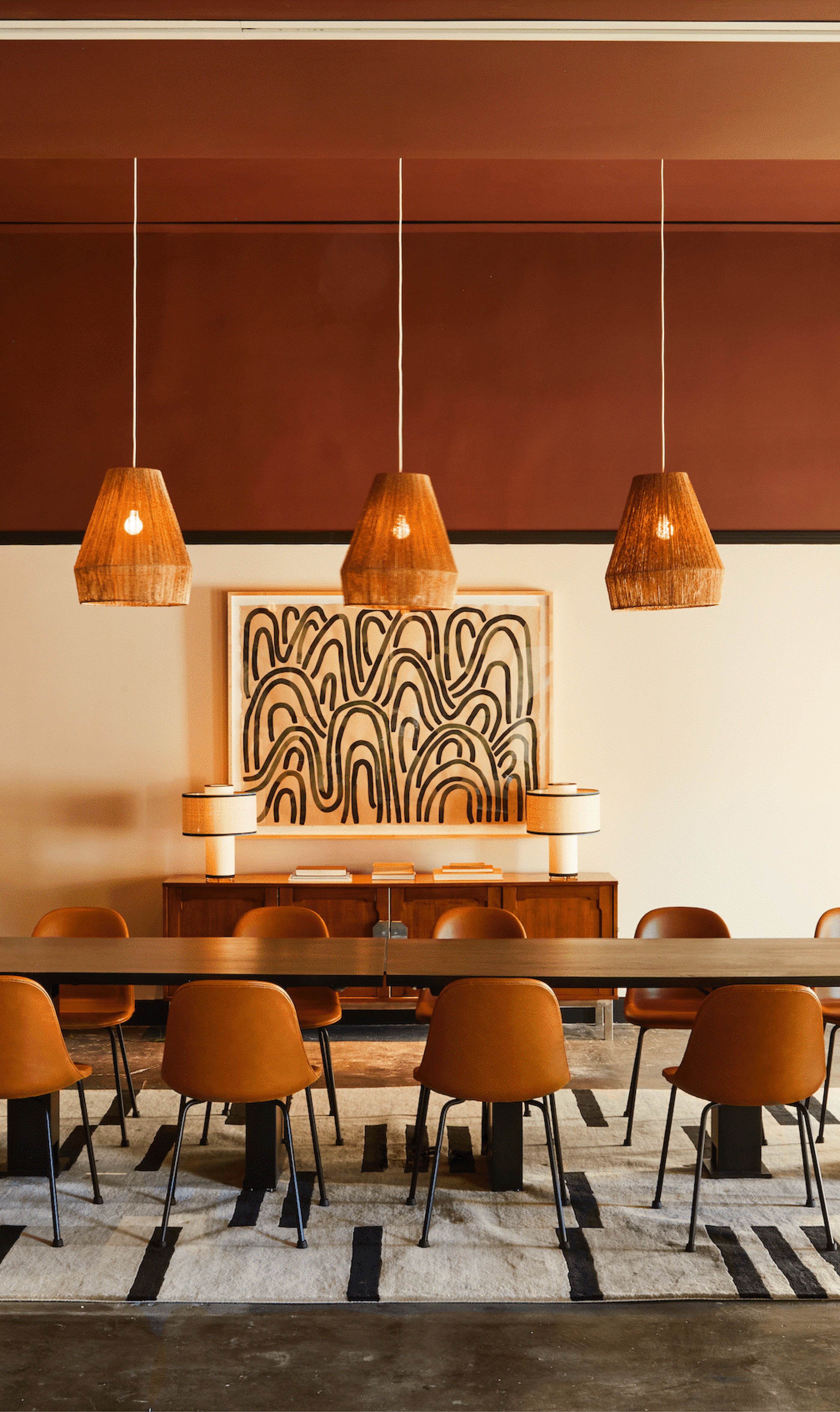 An orange meeting room inside the Chief flagship.